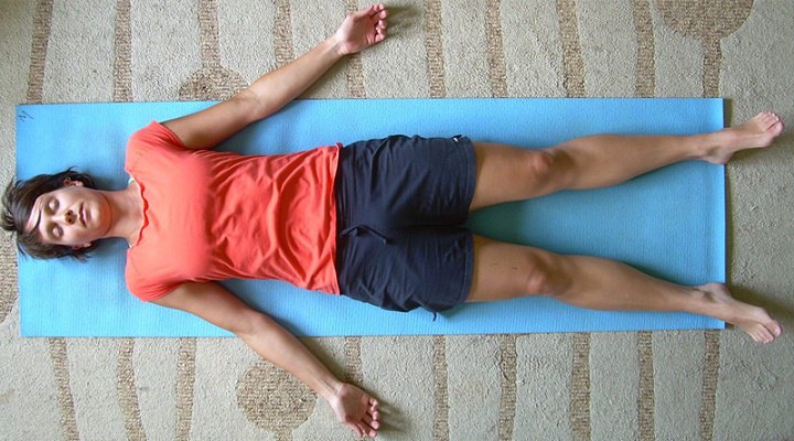 Shavasana movement or corpse pose in hatha yoga